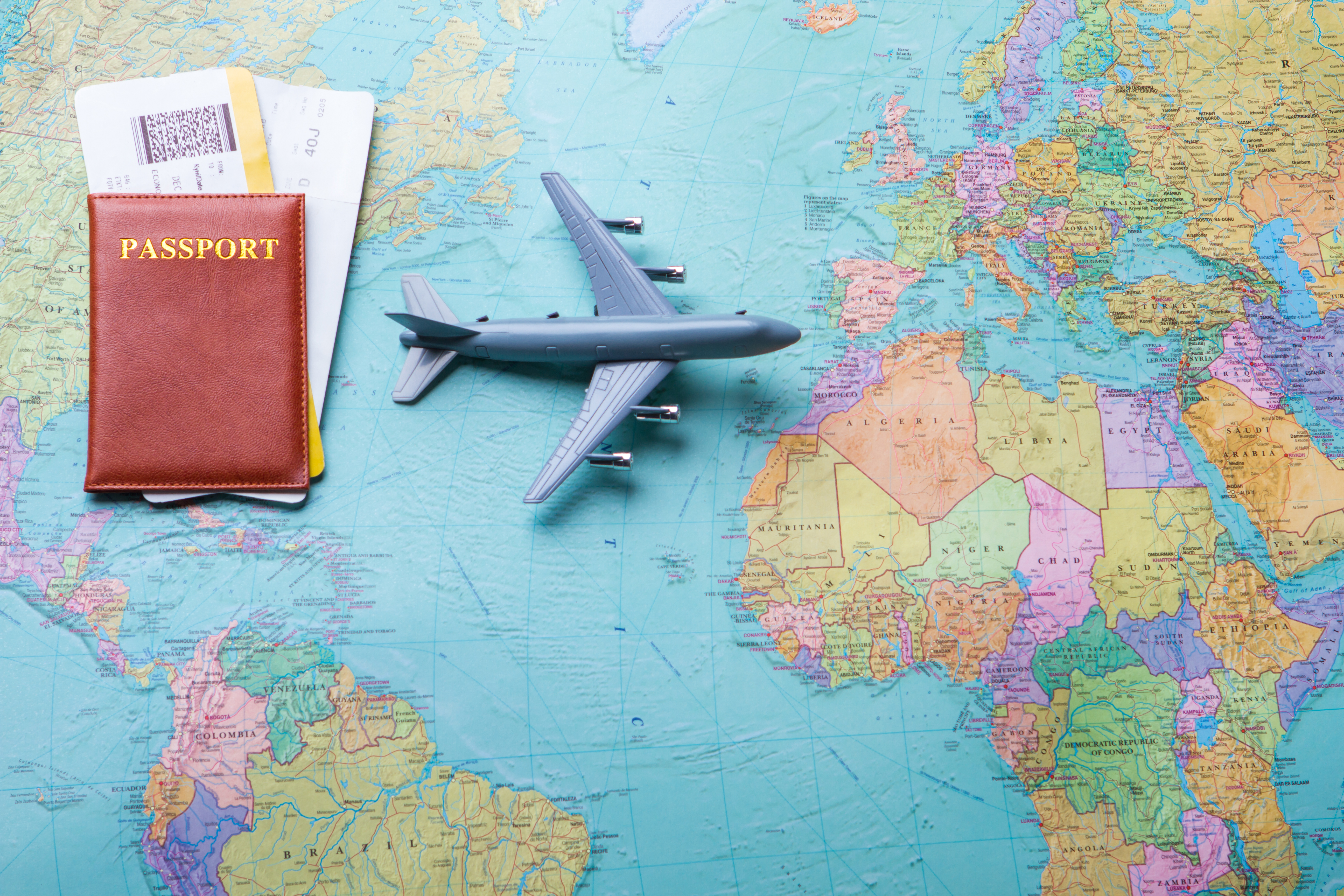 Passport and tickets on map